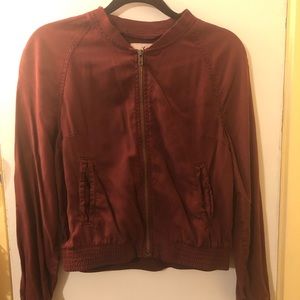 Burgundy bomber style jacket